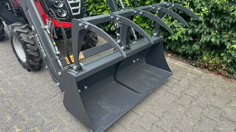 Fieldtrac 929EGT, mit Frontlader und Krokodilschaufel ab 270 € pro Monat.